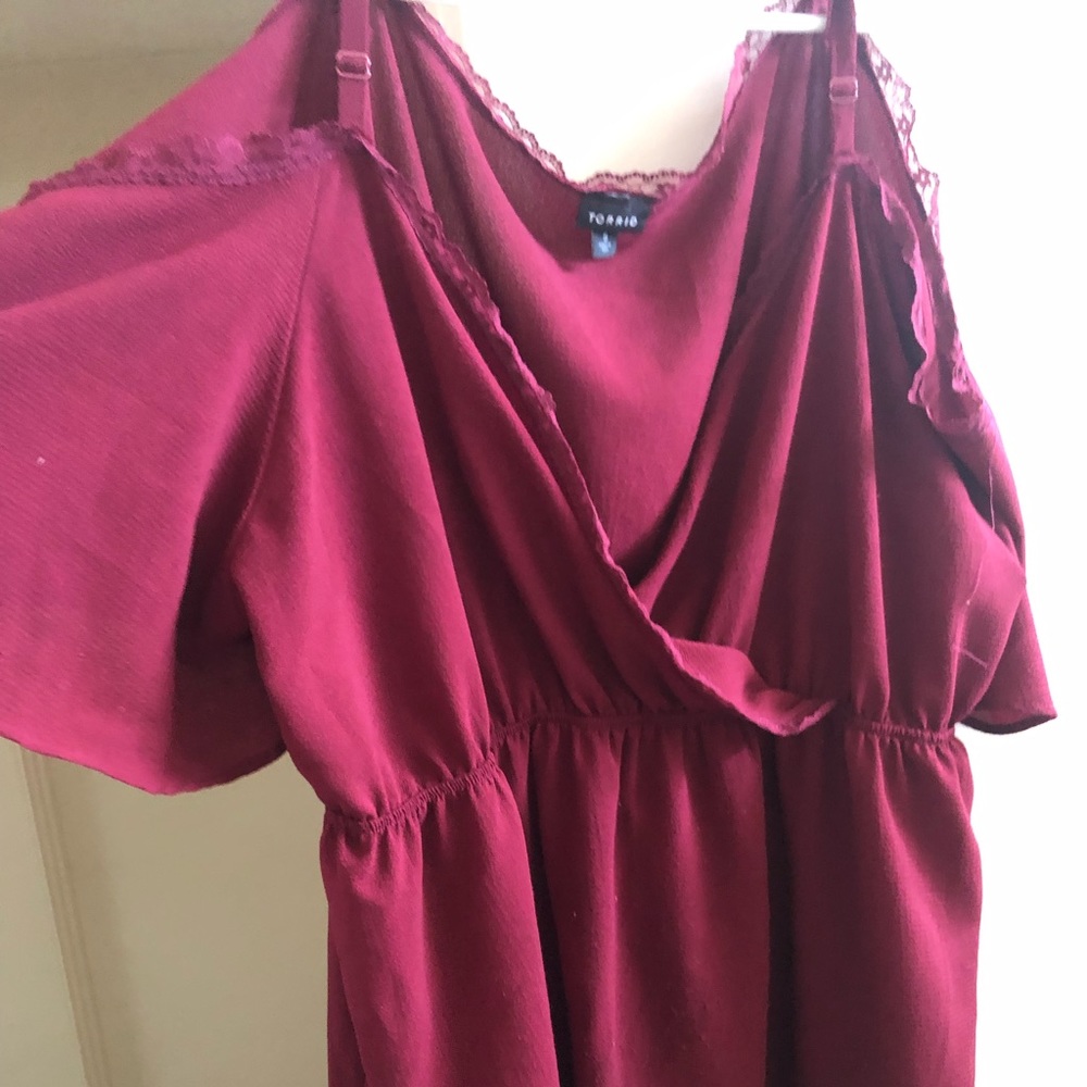 Torrid lace trimmed cold shoulder top